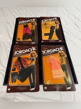 Vintage 70’s/80’s Jordache Pack of Four Doll Outfits in Pink, Black, Red, Yellow